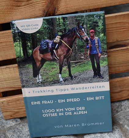 Eine Frau ein Pferd